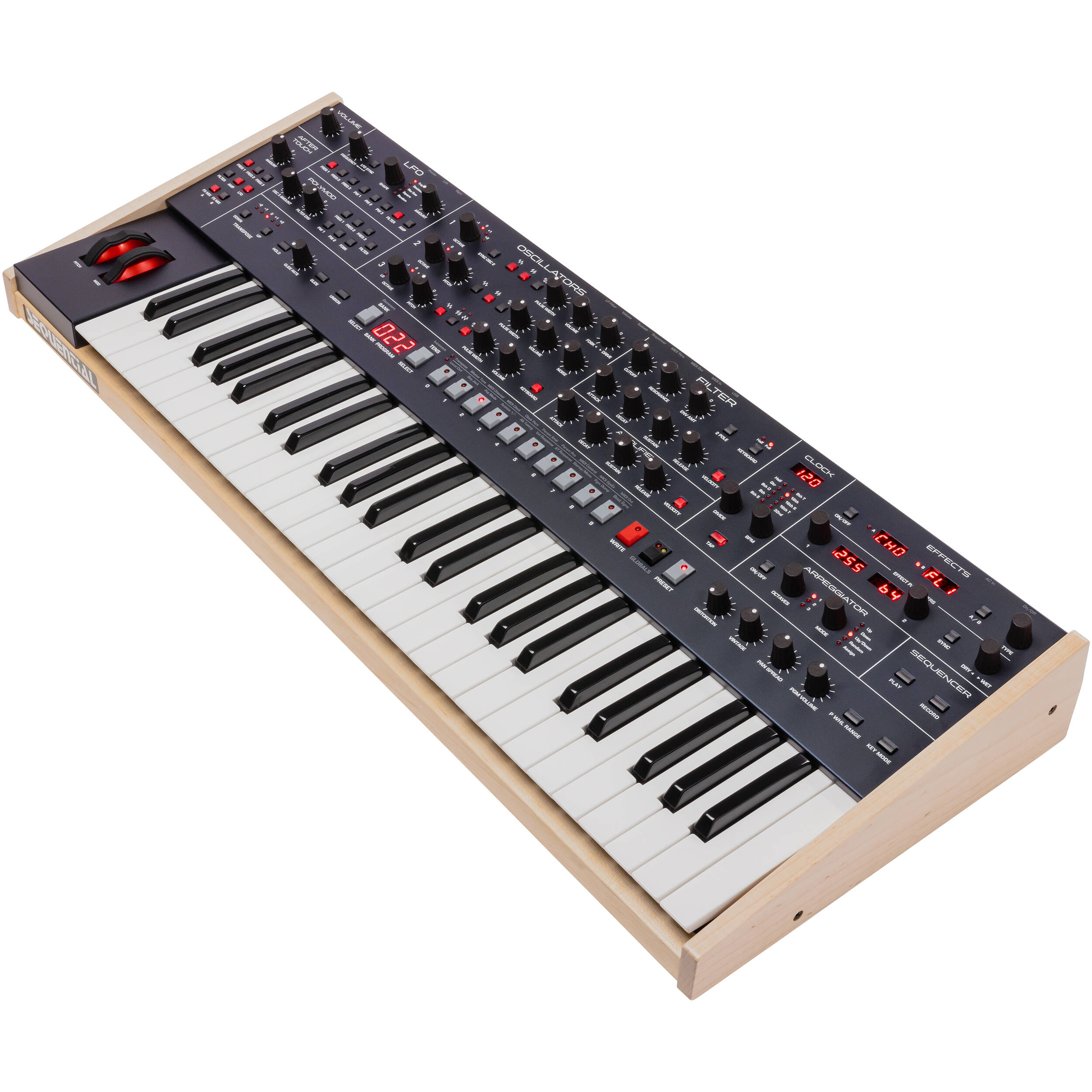 Sequential Trigon-6 synthesizer with a sleek black control panel and multiple knobs and patch points for sound shaping.