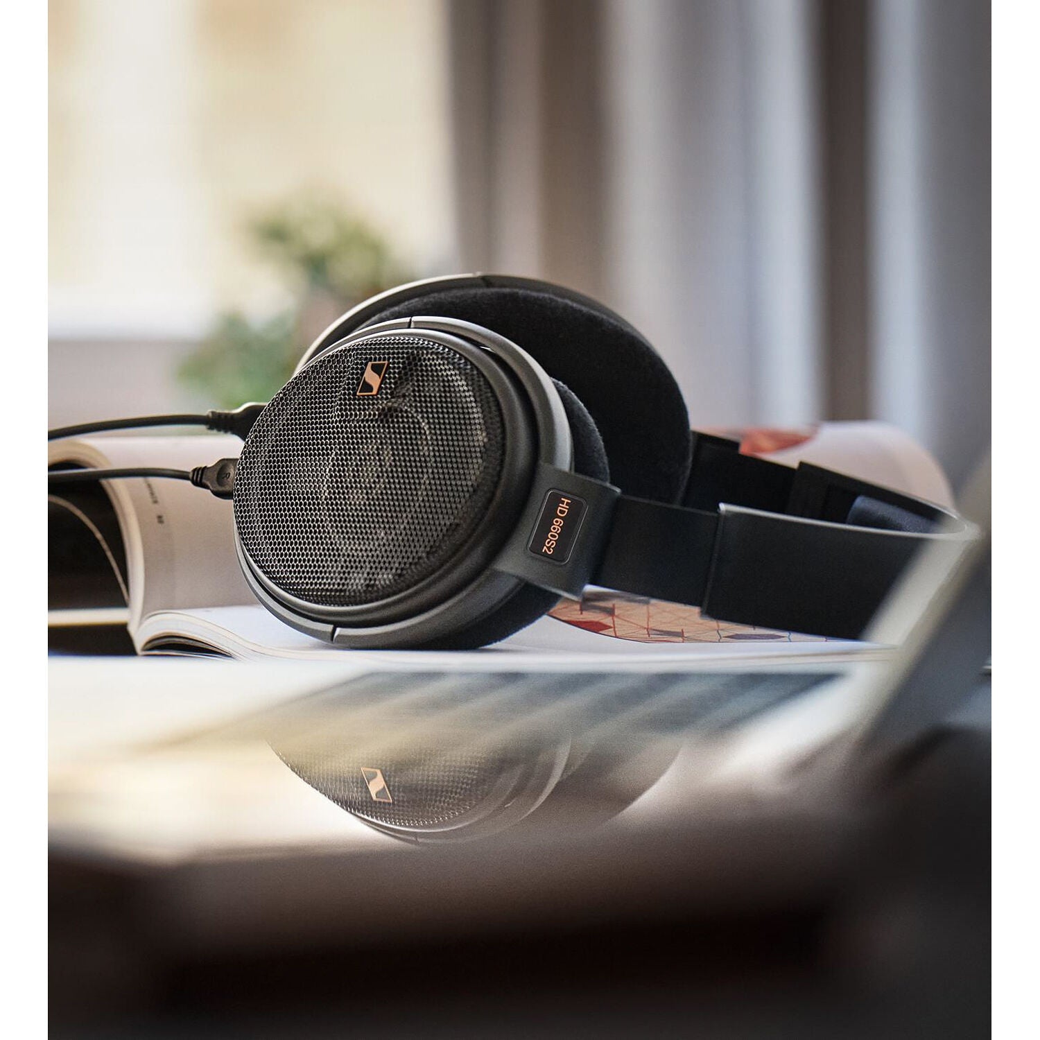 Sennheiser HD 660S2 open-back headphones with large ear cups and sleek design, showcasing high-fidelity audio quality.