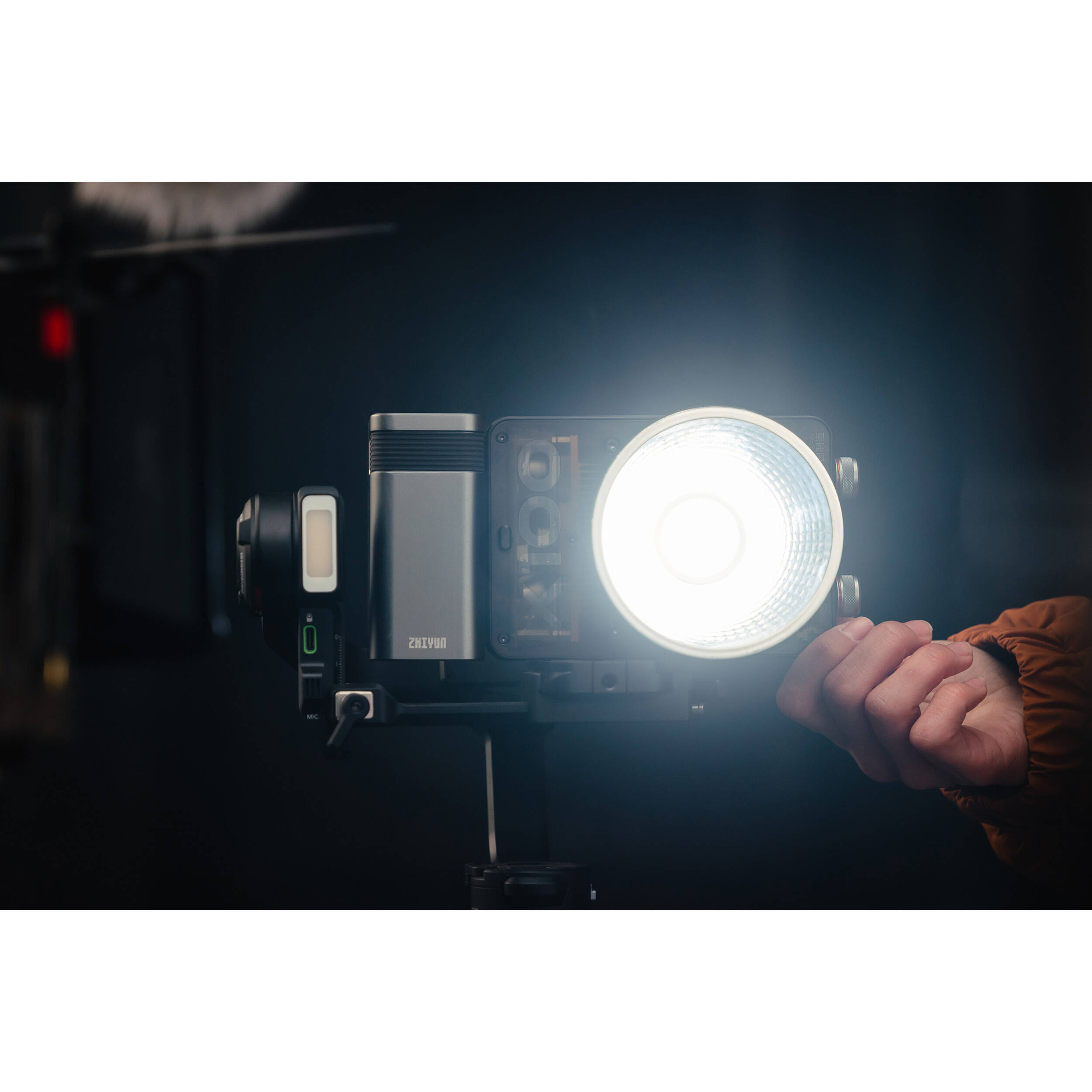 Zhiyun Molus X100 Bi-Color LED lights in a combo pack with adjustable panels and light controls, ideal for professional lighting setups.