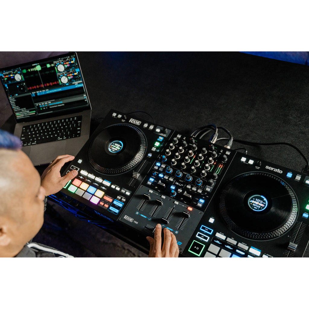 Rane Four DJ controller with jog wheels, mixer controls, and performance pads, designed for professional DJ setups.