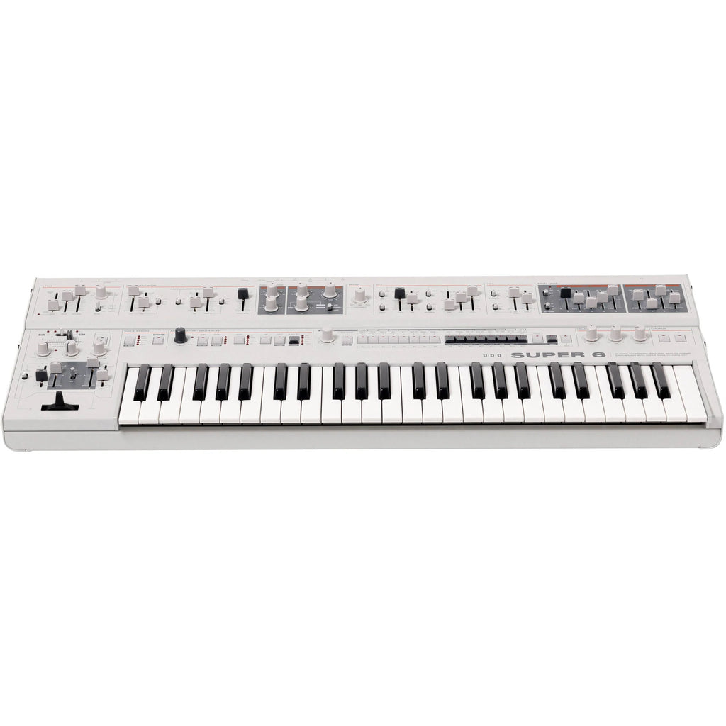 UDO Audio Super 6 synthesizer keyboard with multiple control knobs and a digital display, designed for music production.