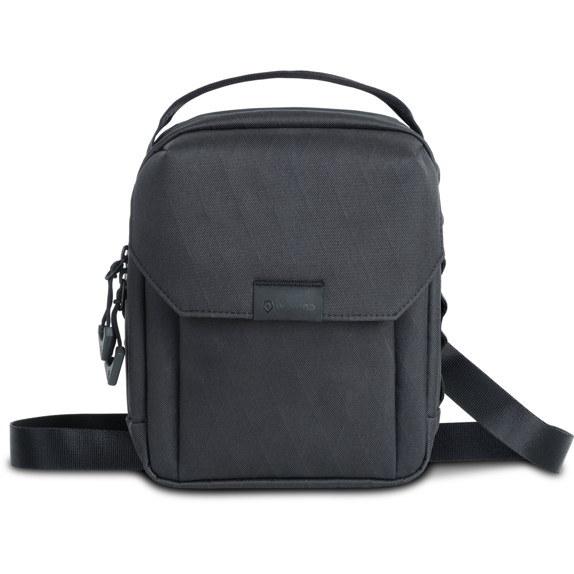 Wandrd X1 Cross Body video equipment bag with padded compartments and adjustable strap for carrying cameras and accessories.