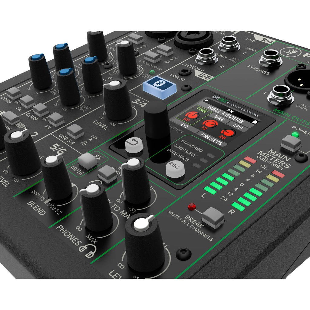 Mackie ProFX6v3+ analog mixer with multiple input channels, knobs, and faders for professional audio mixing.