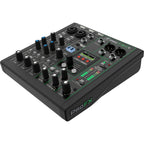 Mackie ProFX6v3+ analog mixer with multiple input channels, knobs, and sliders for professional audio mixing setup.