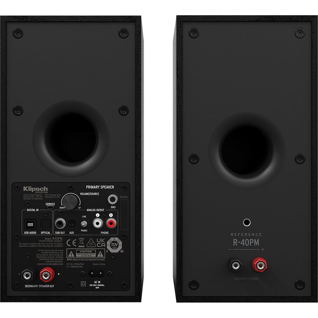 Black Klipsch R-40PM wireless speakers with sleek design and speaker grille, showcasing modern audio equipment for home sound.