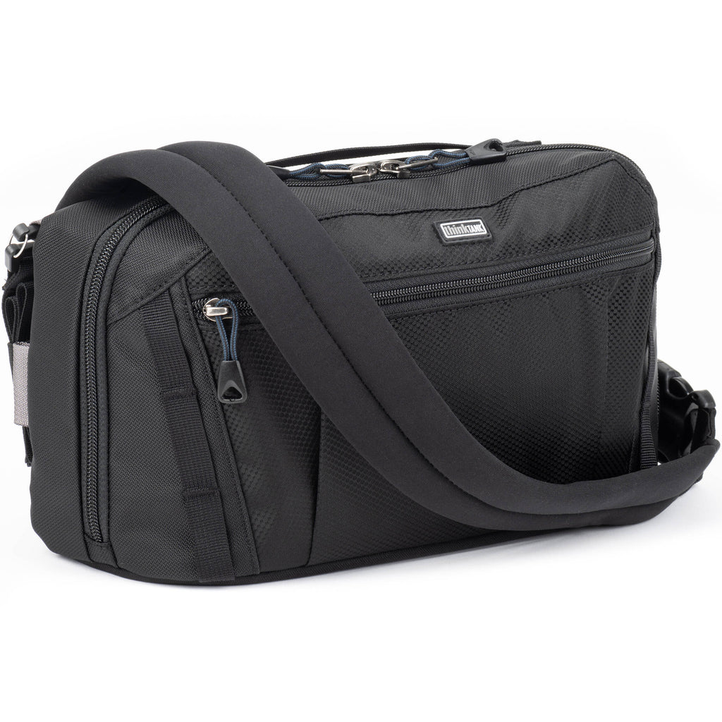 Think Tank PressPass video equipment bag with padded compartments and adjustable straps for professional gear transport.