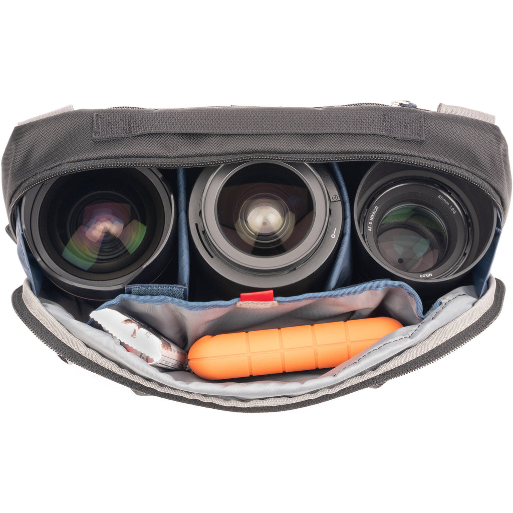 Think Tank PressPass camera and video equipment bag with padded compartments for gear storage and protection.