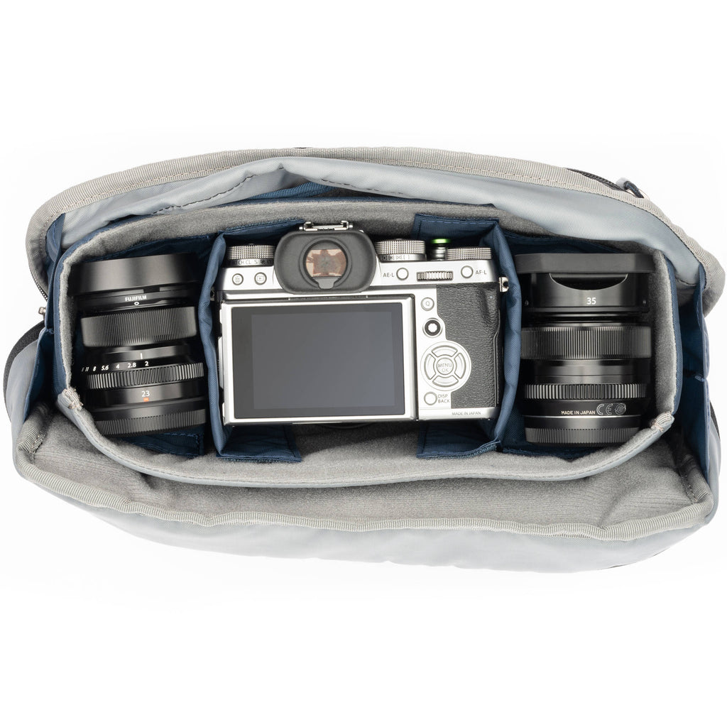 Think Tank PressPass video equipment bag with padded compartments and adjustable straps for professional camera gear transport.