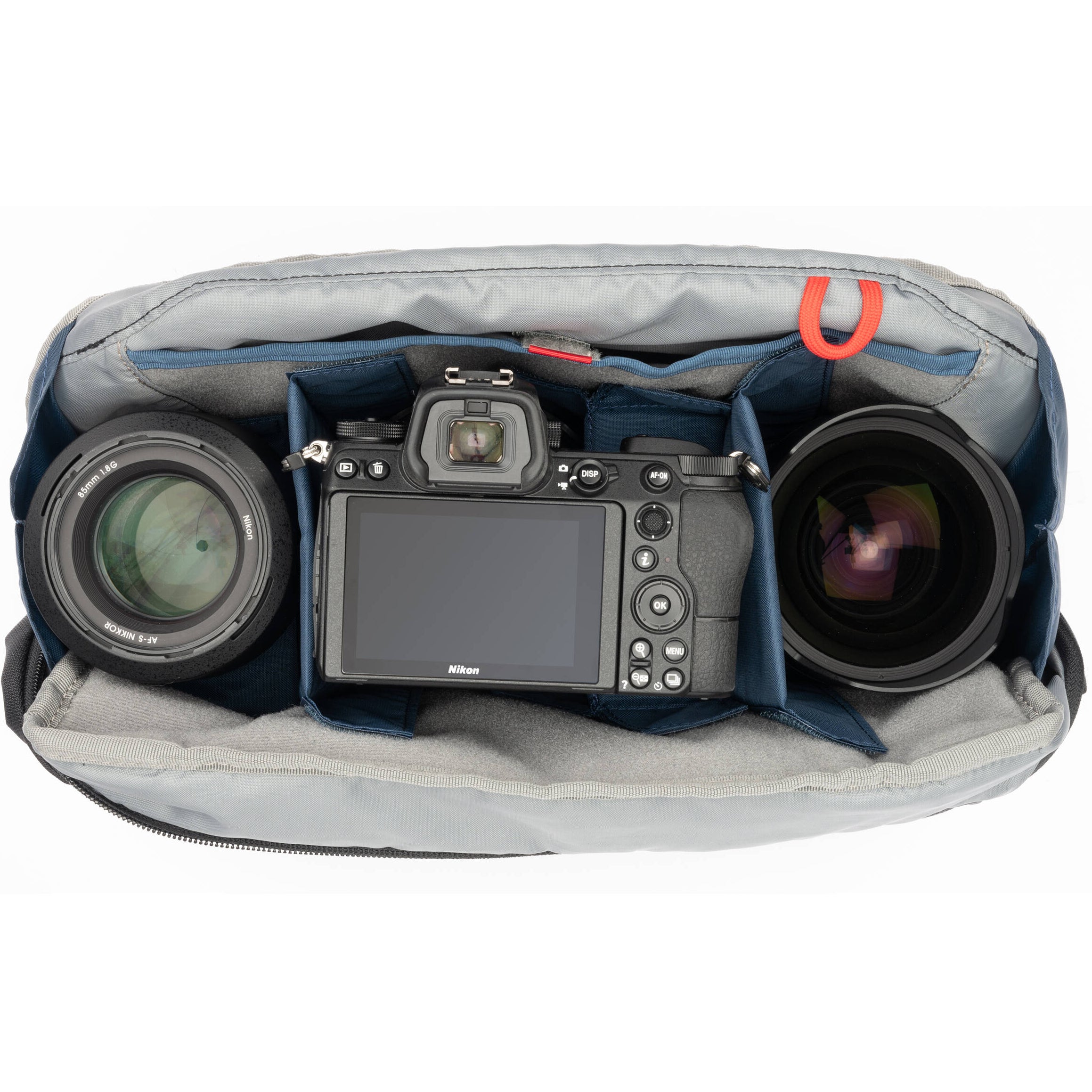 Think Tank PressPass video equipment bag with padded compartments and adjustable straps for professional camera gear storage.