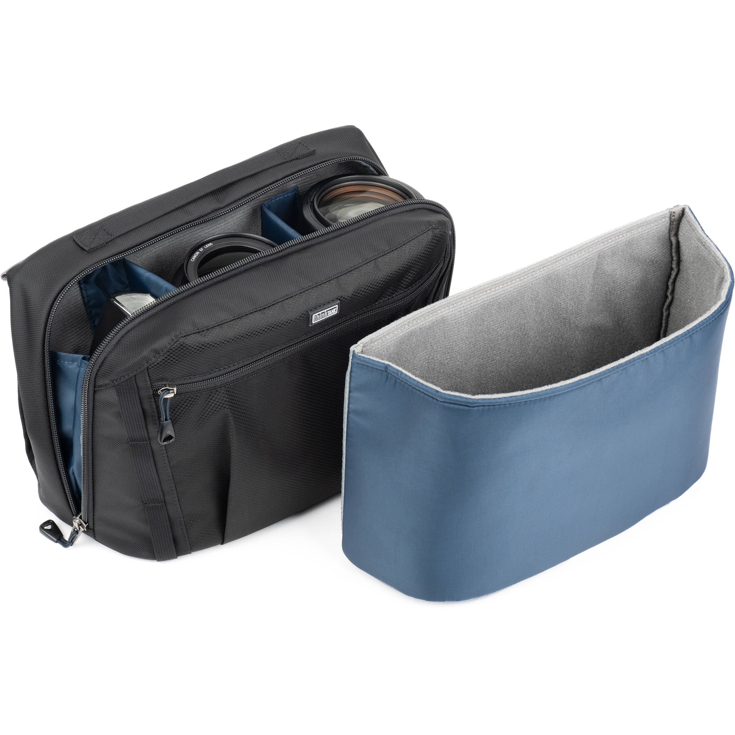 Think Tank PressPass video equipment bag with padded compartments and adjustable straps for professional camera gear storage.