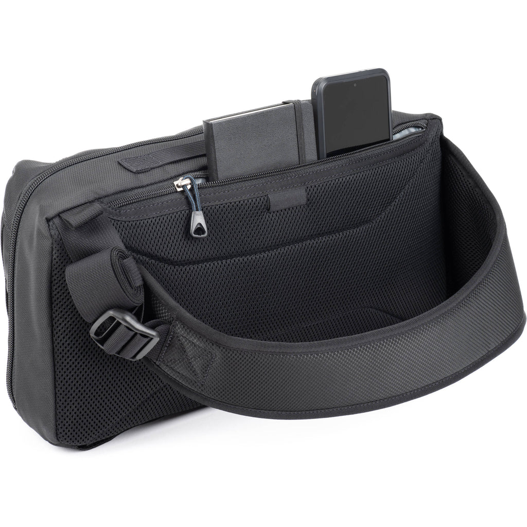 Think Tank PressPass Sling Bag for video equipment, black nylon with adjustable strap and multiple compartments.