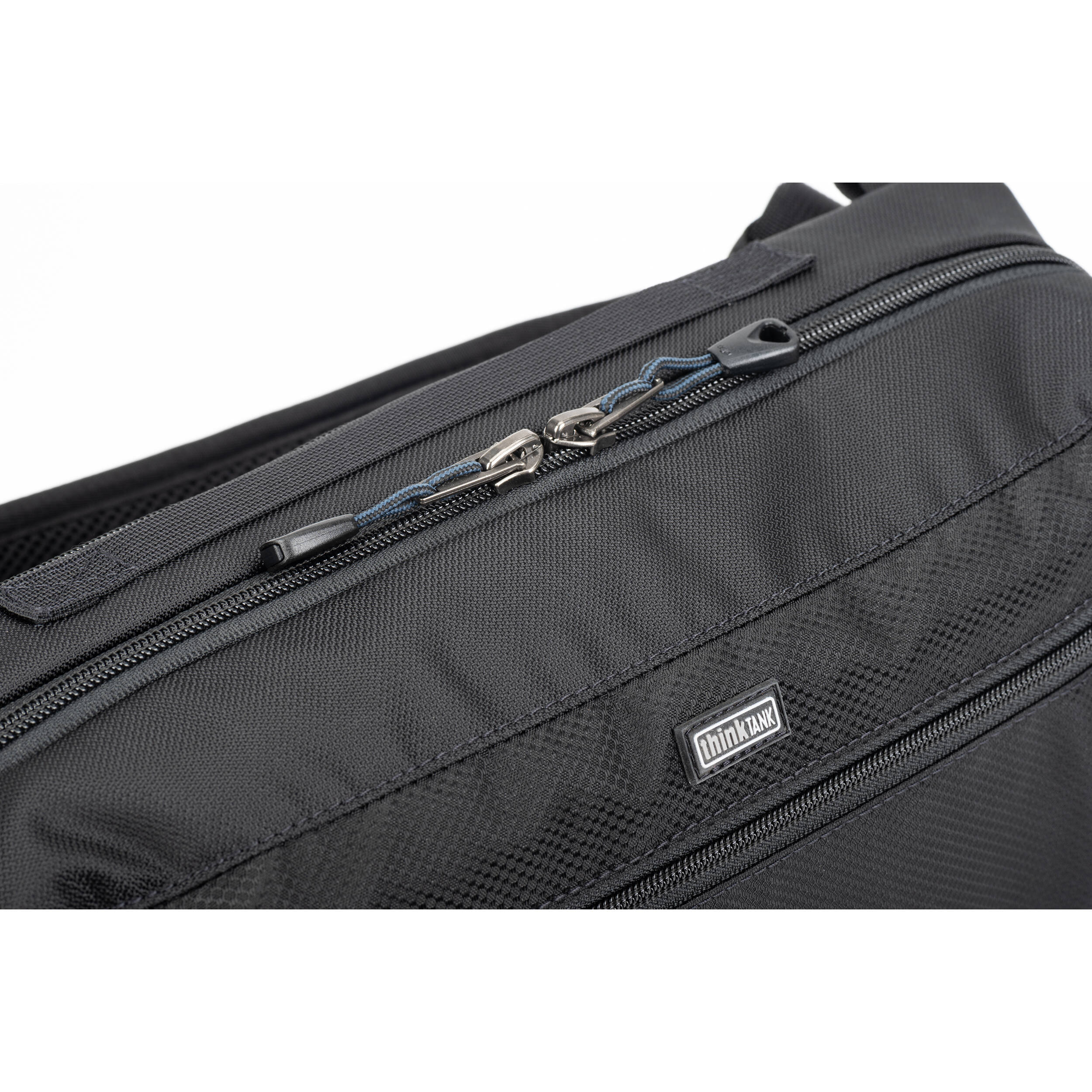 Think Tank PressPass Sling Bag for video equipment, featuring padded compartments and adjustable strap for comfortable carrying.