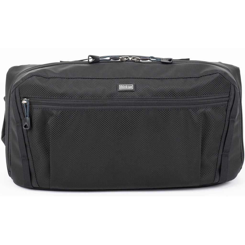 Think Tank PressPass Sling Bag for video equipment, featuring multiple compartments and adjustable strap for easy carrying.