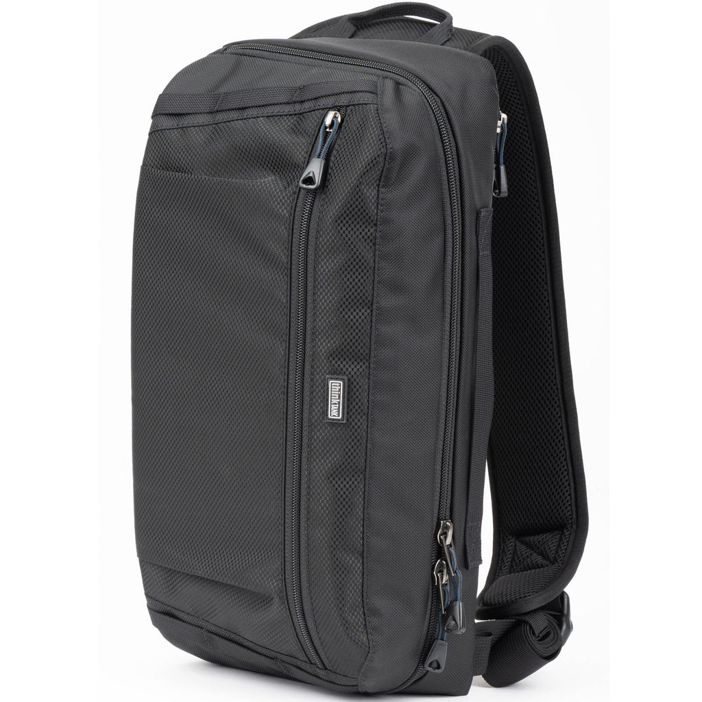 Think Tank PressPass Sling Bag for video equipment, black sling bag with adjustable strap and multiple compartments.