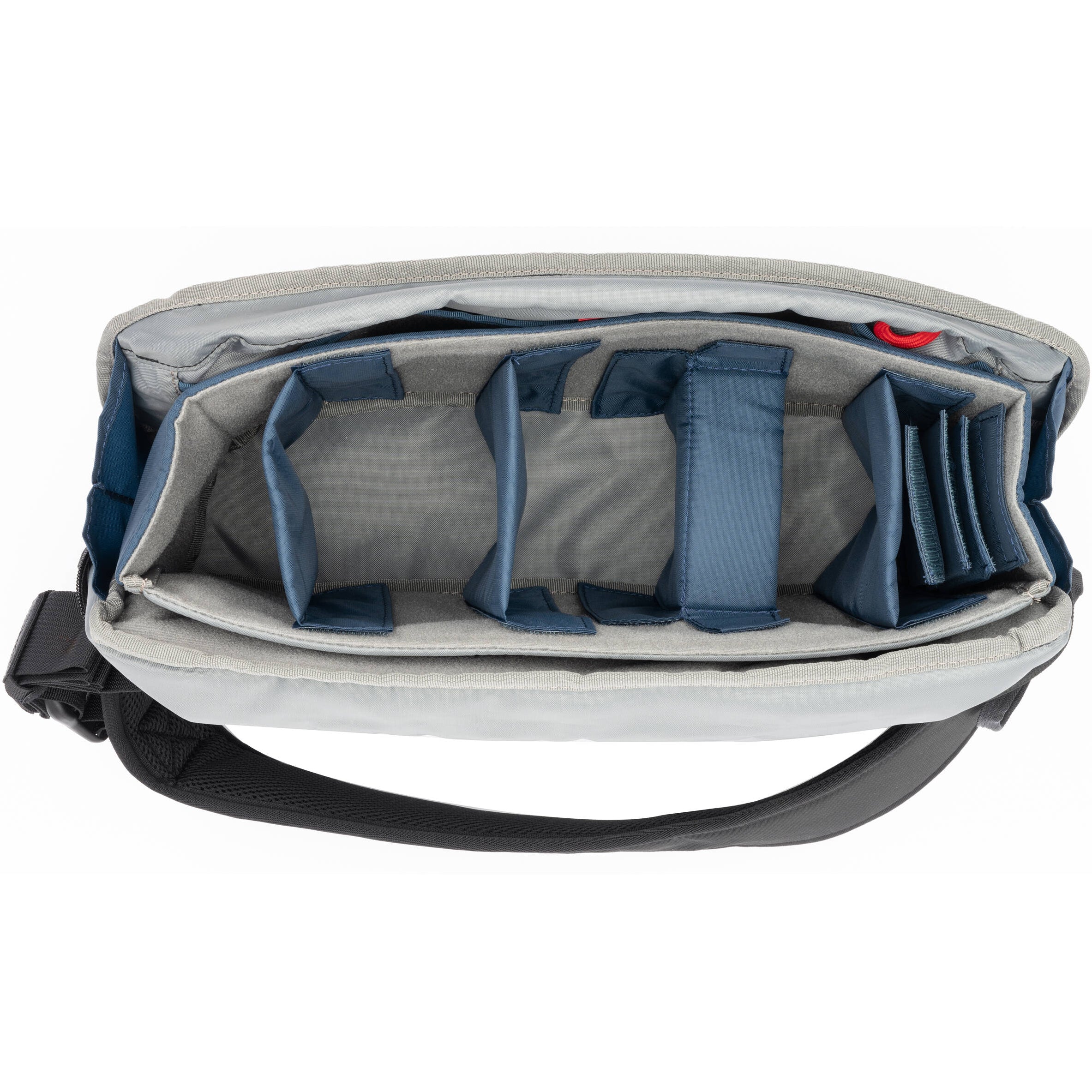 Think Tank PressPass Sling Bag for video equipment with padded compartments and adjustable straps, designed for professional videographers.