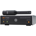 IK Multimedia ARC Studio room calibration device connected to audio equipment, demonstrating sound optimization setup.