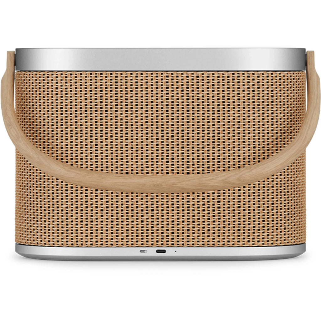 Bang & Olufsen Beosound A5 portable speaker showing its sleek design and fabric covering on a neutral background.
