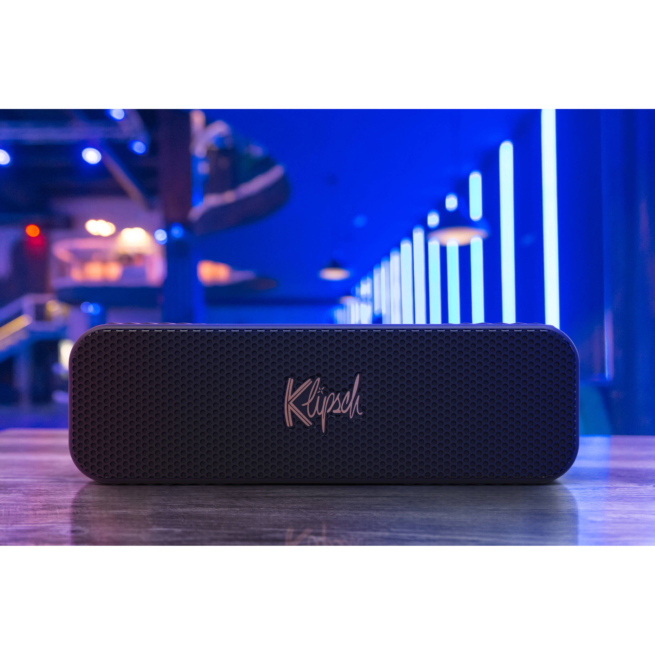 Klipsch Detroit portable speakers showcasing sleek design and premium sound quality in a stylish home setting.