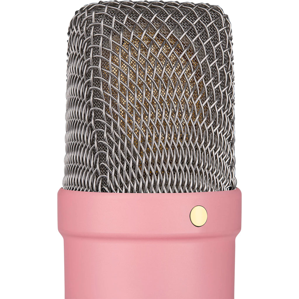 Rode NT1 Signature Series condenser microphone with metal body and shock mount for studio recording and professional audio.