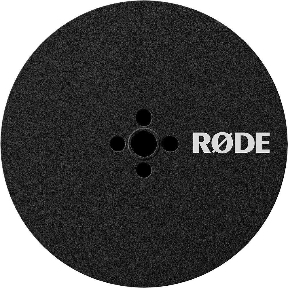 Rode Magnetic Mount attached to a tripod, designed for secure support of microphones and audio equipment.