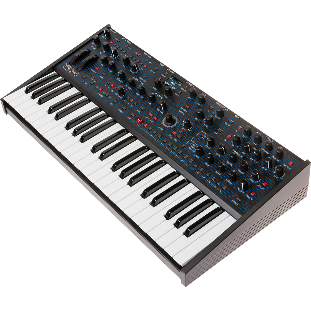 Oberheim TEO-5 synthesizer with vintage design and multiple control knobs, showcasing electronic music equipment.