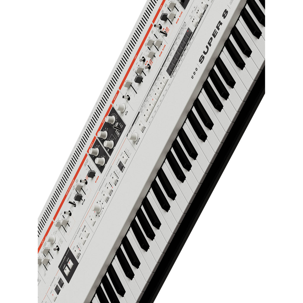 UDO Audio Super 8 synthesizer with vintage-style controls and colorful interface, showcasing its keyboard and panel layout.