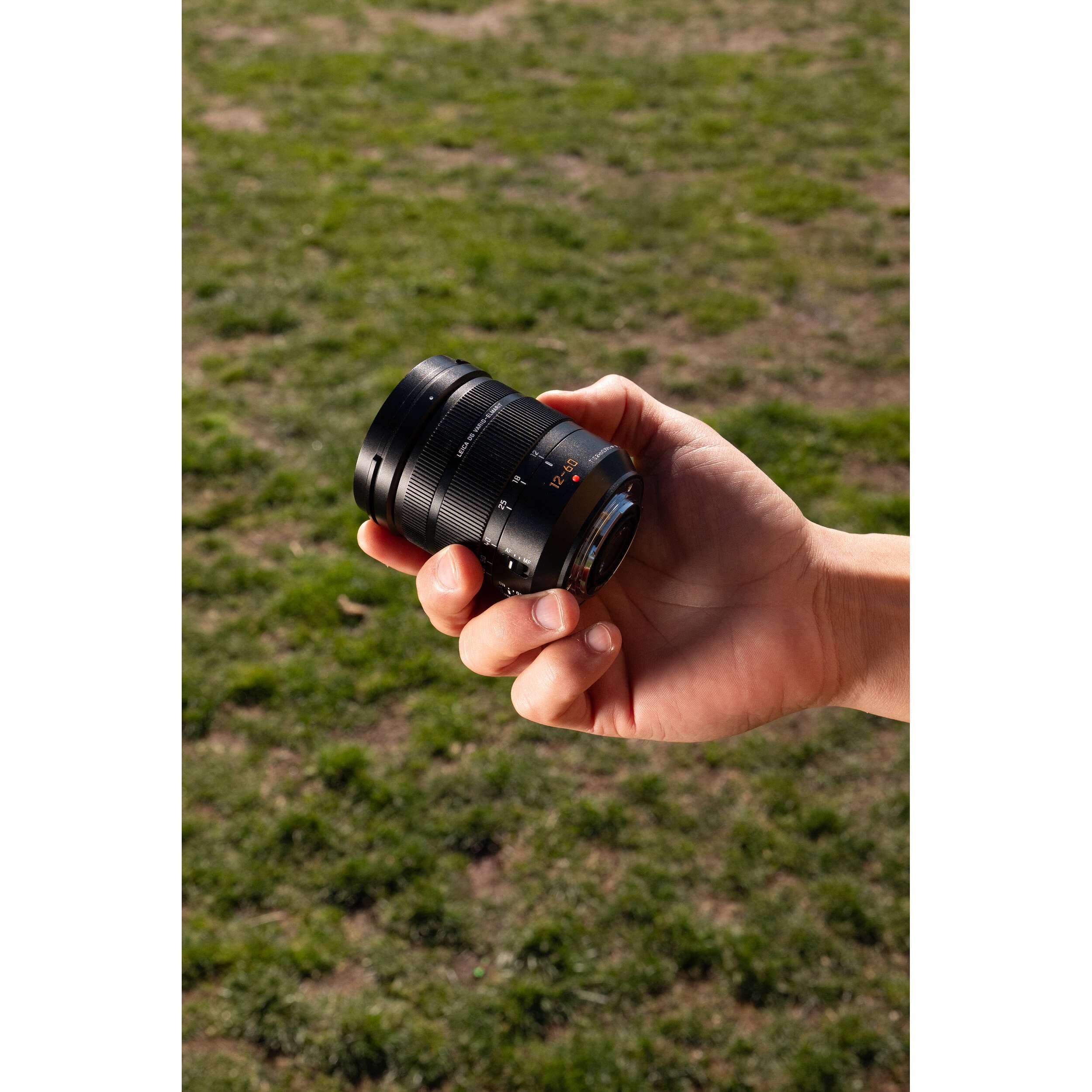 Panasonic Lumix GH7 mirrorless camera with 12-60mm F/2.8-4 lens, showcasing the camera body and zoom lens attached.
