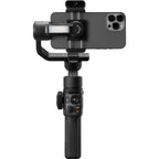 Zhiyun Smooth 5S AI Pro stabilizer and gimbal setup with smartphone mount, showing sleek design and control handles.