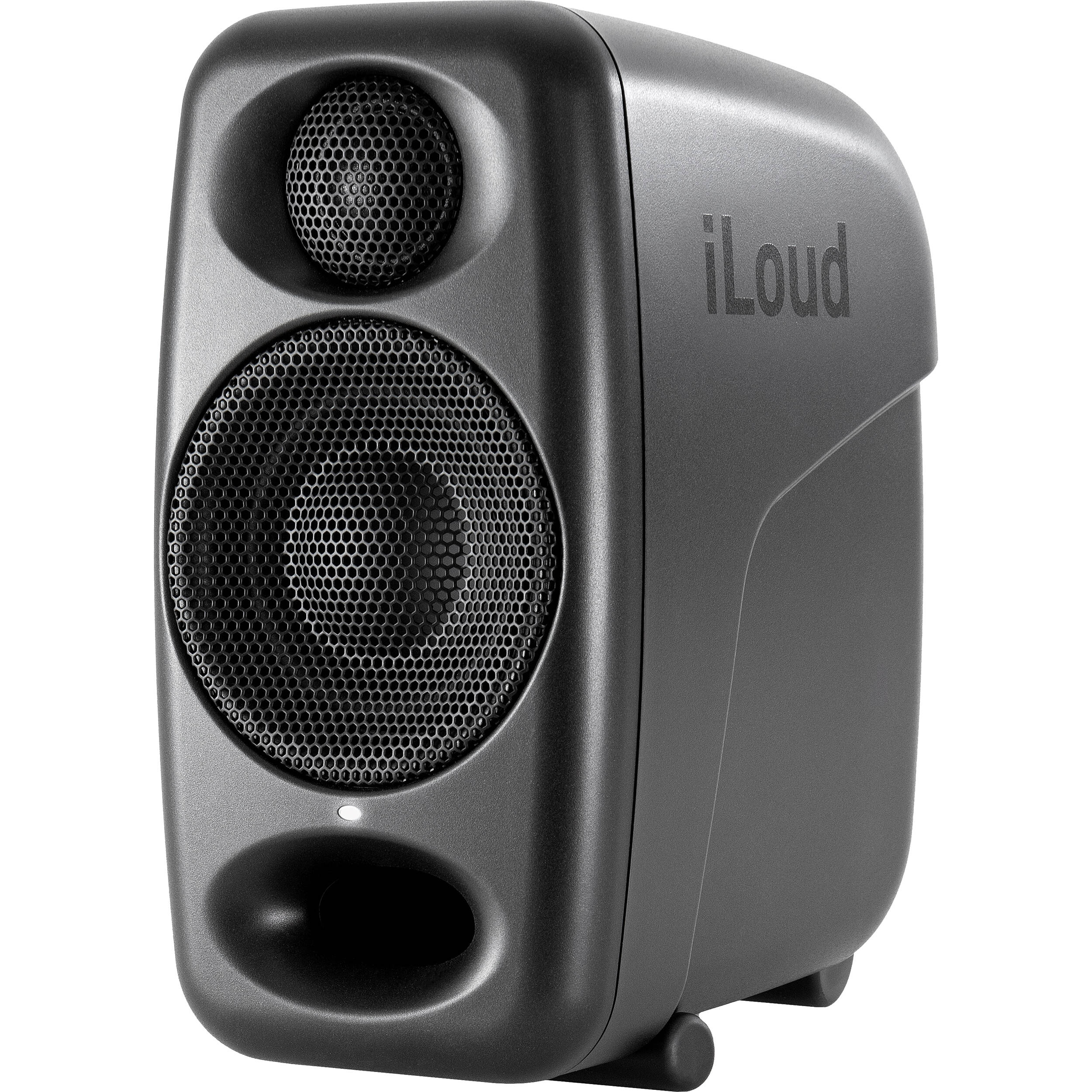 IK Multimedia iLoud Micro Monitor Pro active nearfield studio monitors on a desk with audio equipment.