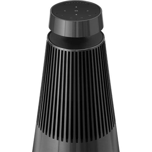 Bang & Olufsen Beosound 2 3rd Gen wireless speaker showing its sleek, cylindrical design in black with touch controls.