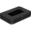 Bluesound Node 2025 black music streamer device with digital and analog outputs, compact and modern design.