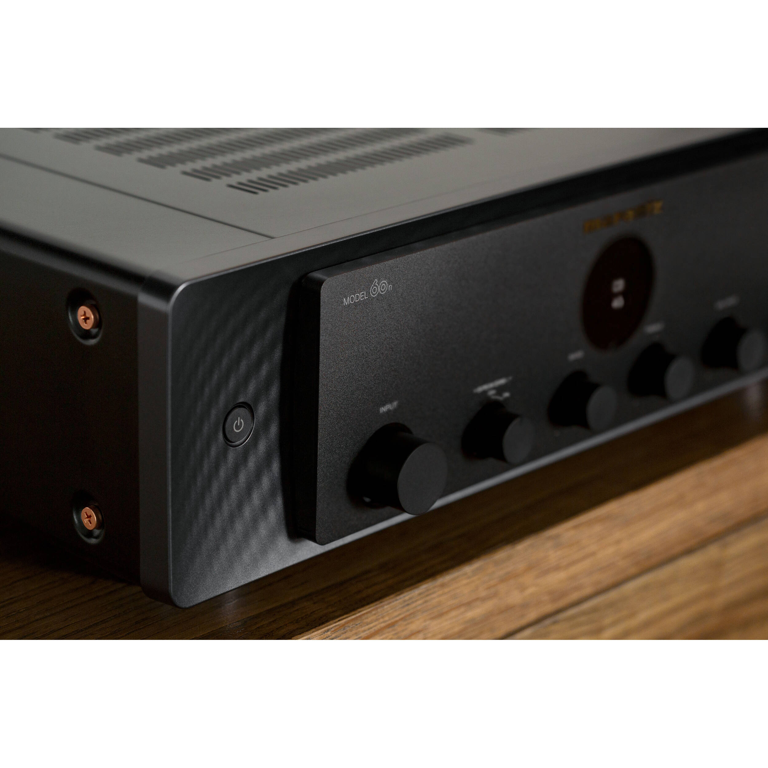 Marantz MODEL 60n stereo amplifier with sleek design and control knobs, showcasing high-quality audio equipment.