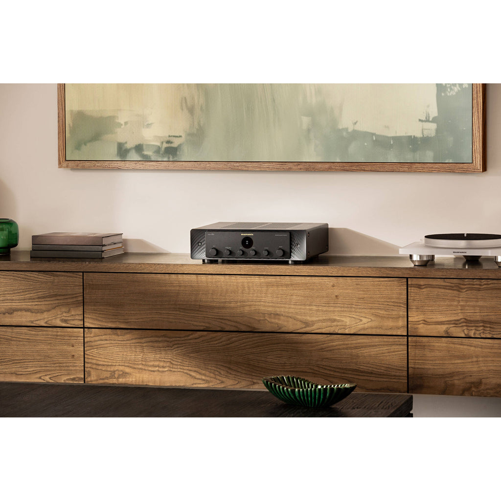 Marantz MODEL 60n stereo amplifier with sleek black design and control knobs, front view showing input options and power button.
