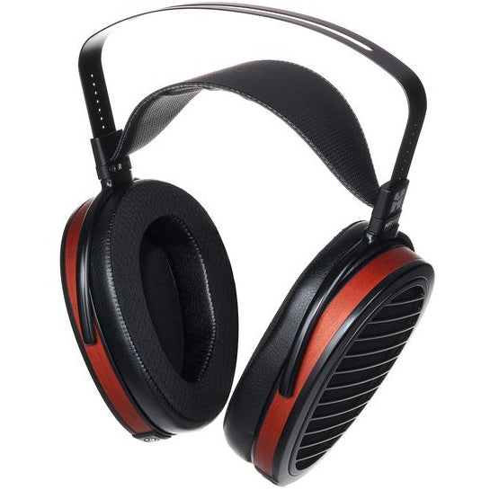 HiFiMAN Arya Organic wired headphones with open-back design and silver ear cups, showcasing premium audio quality and comfort.