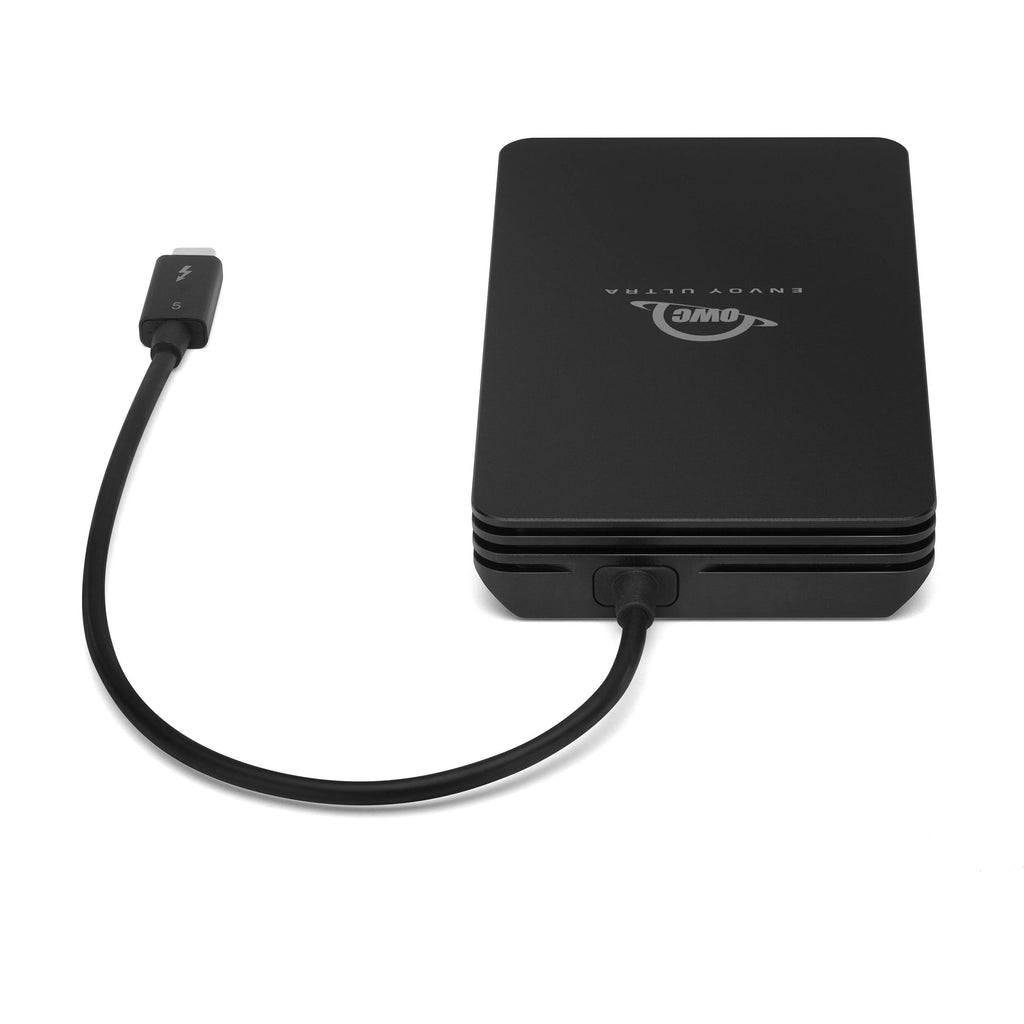 OWC Envoy Ultra SSD external drive with silver metal casing and USB-C connection, designed for fast data transfer.