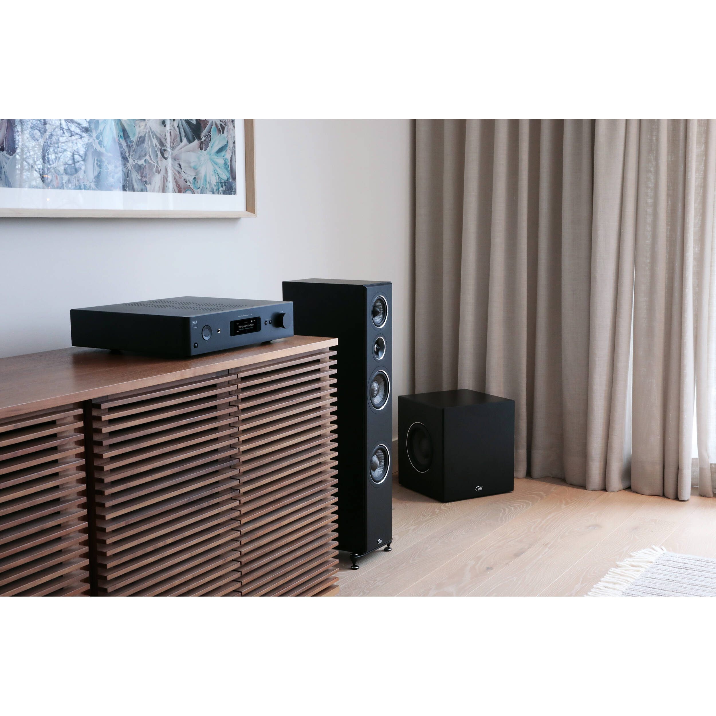 NAD C 379 stereo amplifier with sleek black design and control knobs, showcasing high-quality audio equipment for home sound systems.
