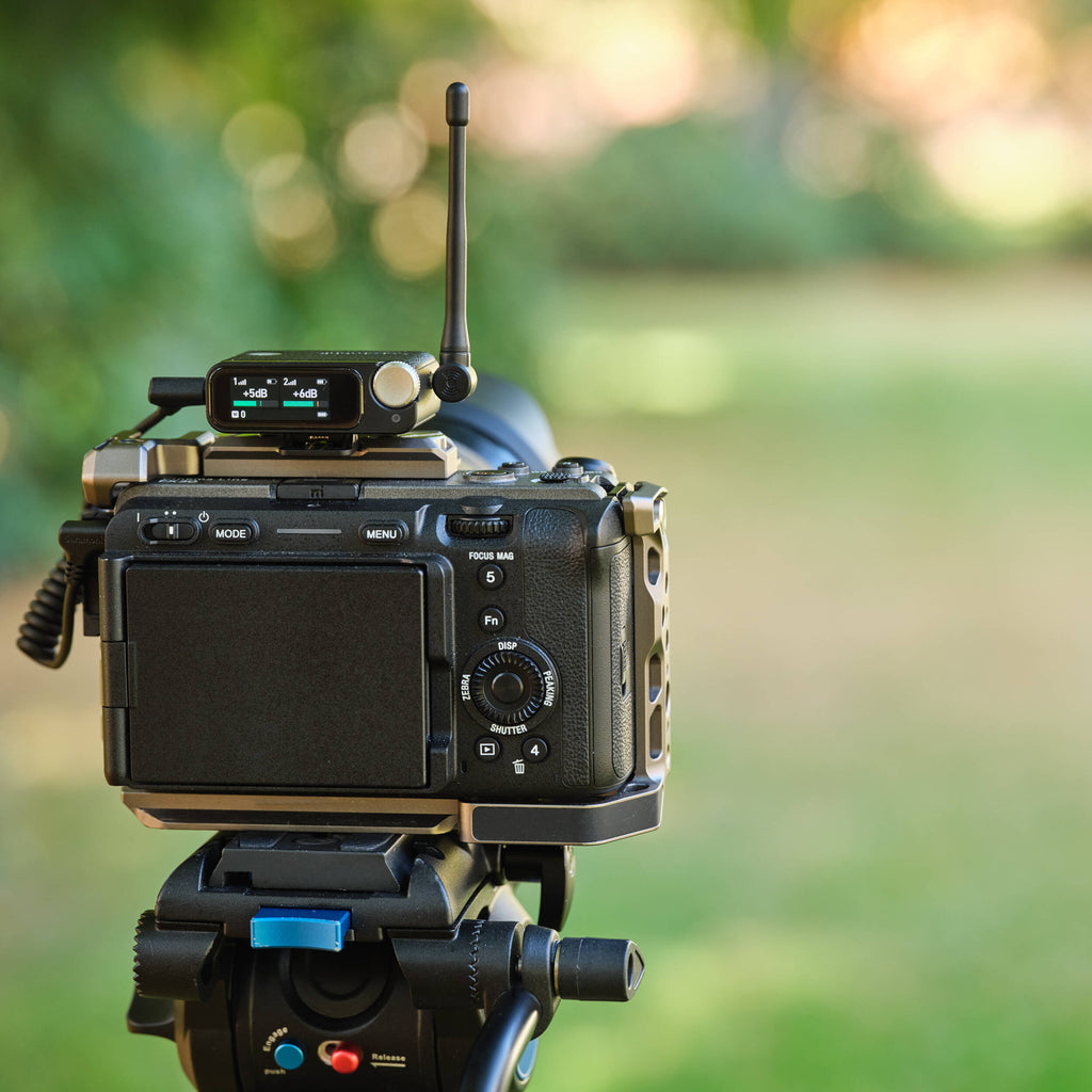 Saramonic Ultra wireless creator microphone system with Lavalier mics, compact design, and transmitter and receiver units.