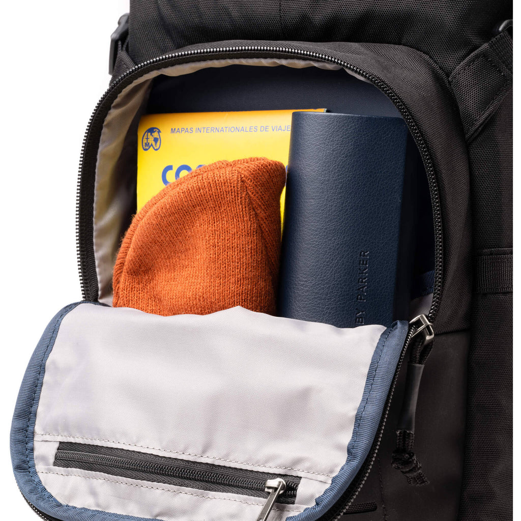 Think Tank DarkLight video equipment bag with padded compartments, black durable fabric, and adjustable straps.