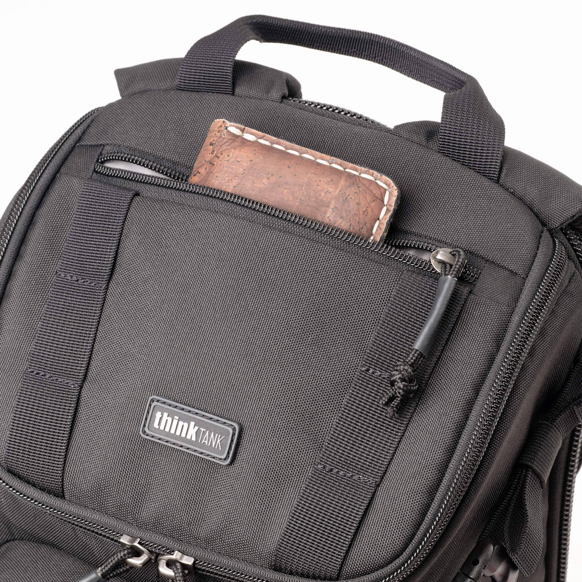 Think Tank DarkLight video equipment bag with padded compartments and adjustable straps, designed for professional gear storage.