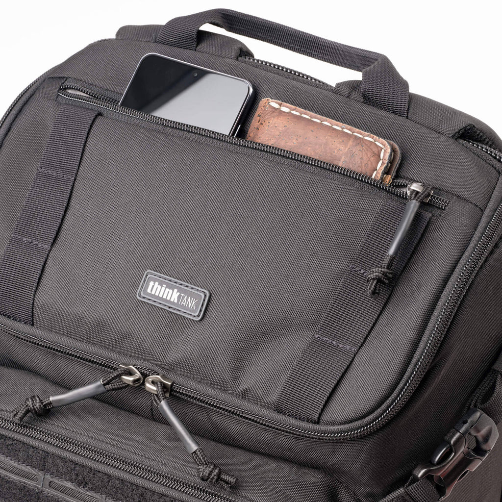 Think Tank DarkLight video equipment bag with padded compartments and adjustable straps for professional camera gear storage.