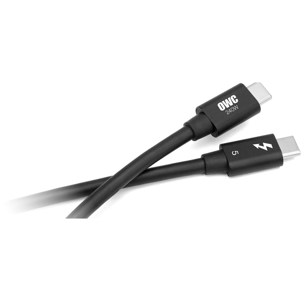 OWC Thunderbolt 5 Hub docking station with multiple ports, sleek black design, connected to a computer for high-speed data transfer.
