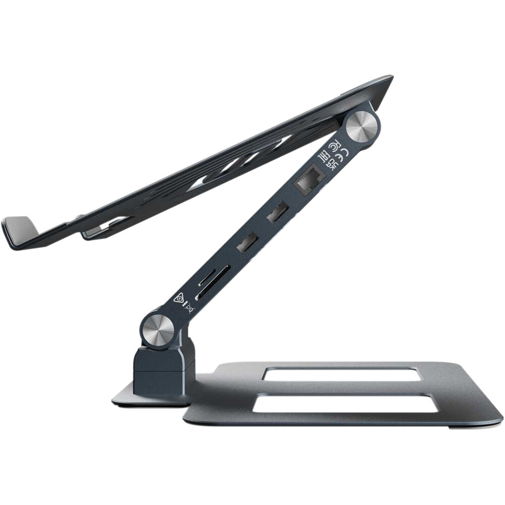 Reloop Stand Hub Pro laptop stand with adjustable height and multiple device slots, black metal construction for ergonomic workspace.