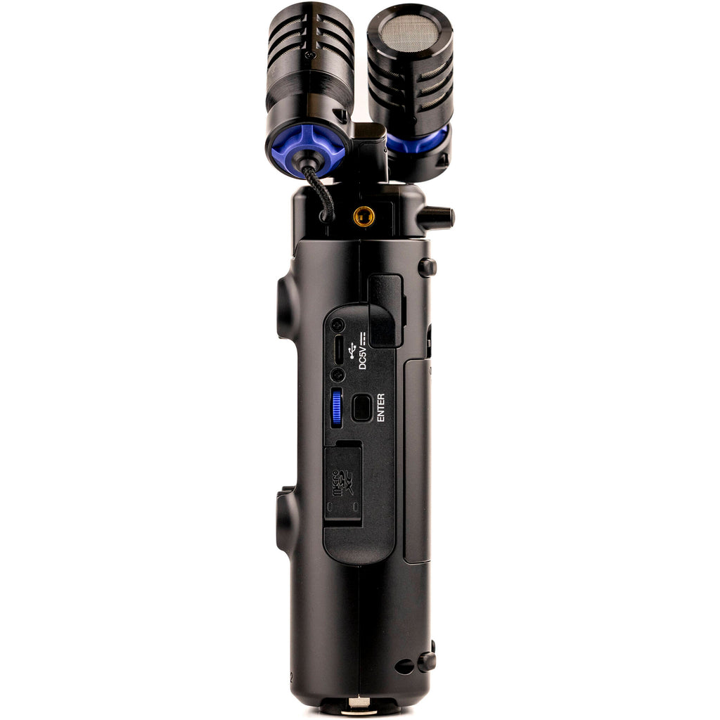 Zoom H5 digital recorder with multiple input ports and LCD screen, used for professional audio recording.