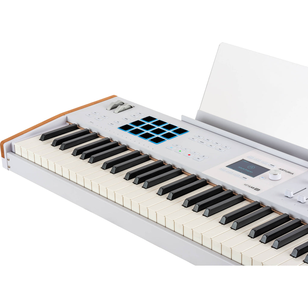 Arturia KeyLab 88 MK3 MIDI keyboard with black keys and control knobs, showing its sleek design and full-sized keys.