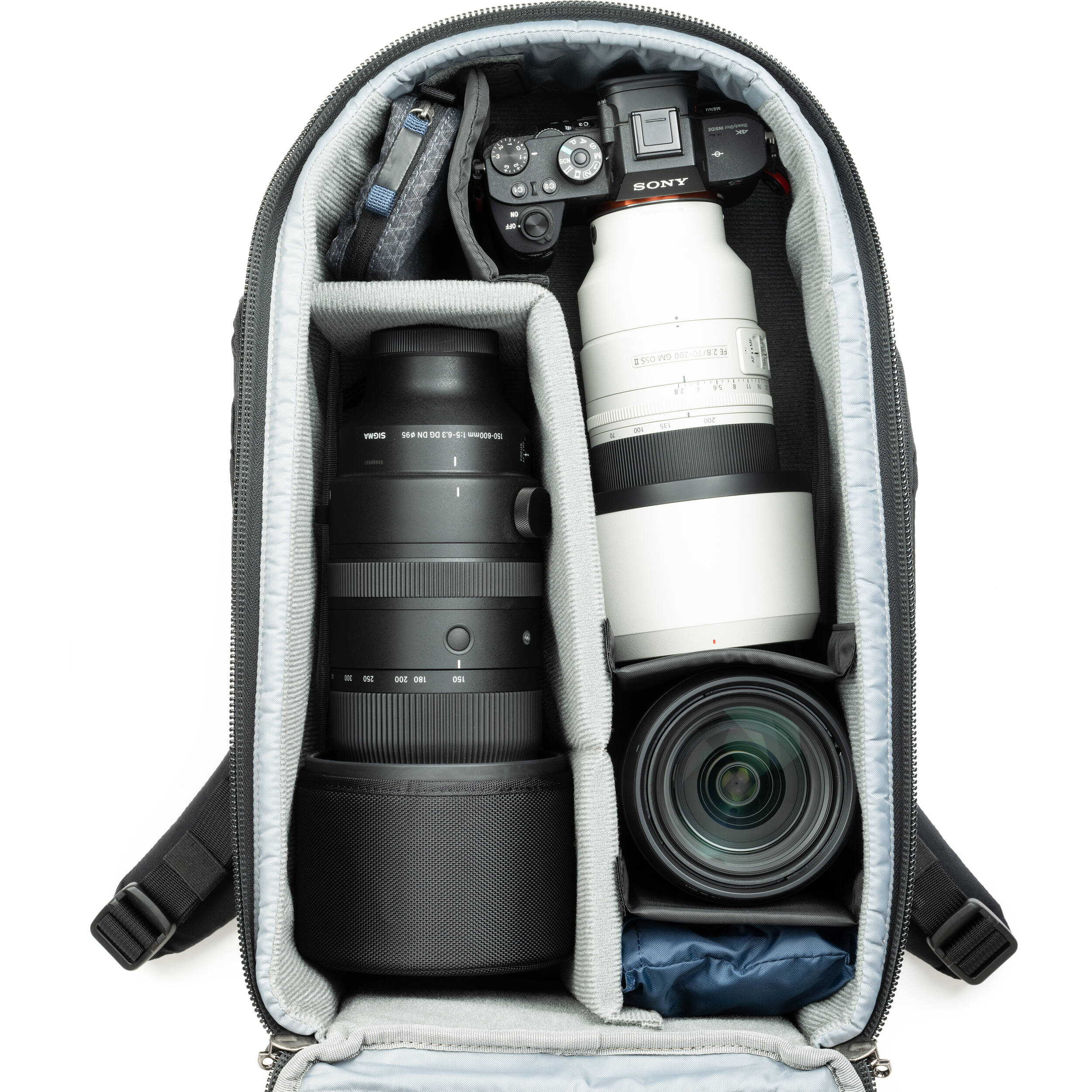 Think Tank Walker Pro Series backpack with multiple compartments for video equipment storage, black nylon material, and padded straps.