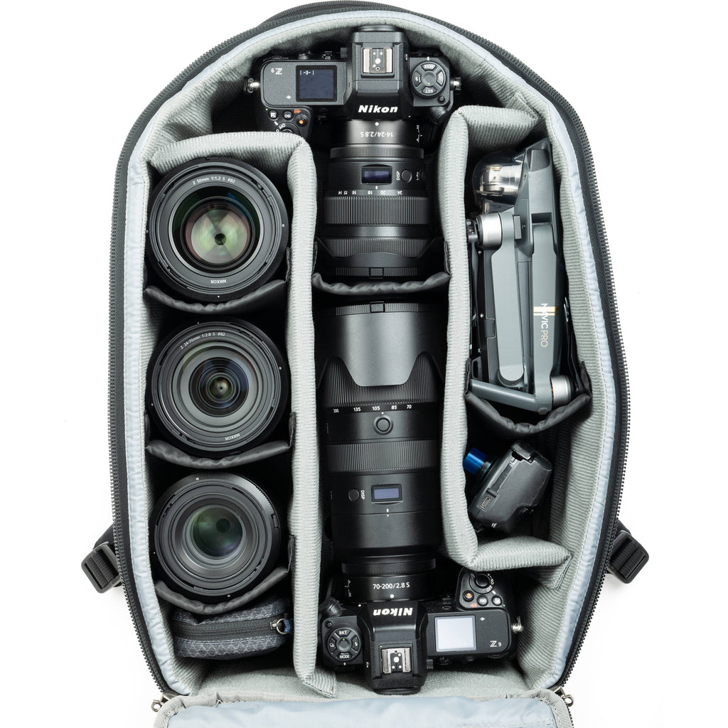 Think Tank Walker Pro Series backpack for video equipment, showing multiple compartments and padded straps for professional use.