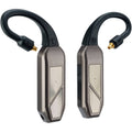 iFi Audio Go Pod Max headphone amplifier and DAC with sleek black design and controls visible on the front panel.