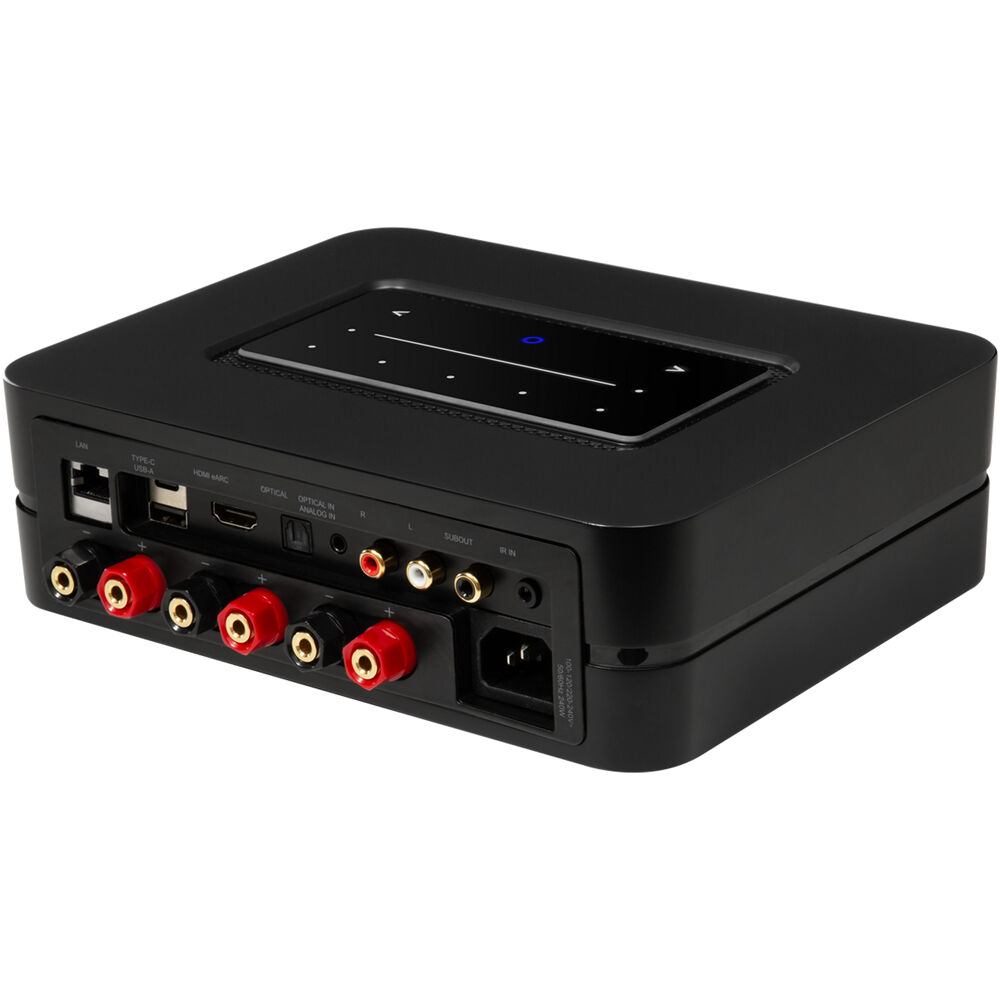 Bluesound Powernode 2025 music streamer with sleek black design, digital display, and connectivity ports.