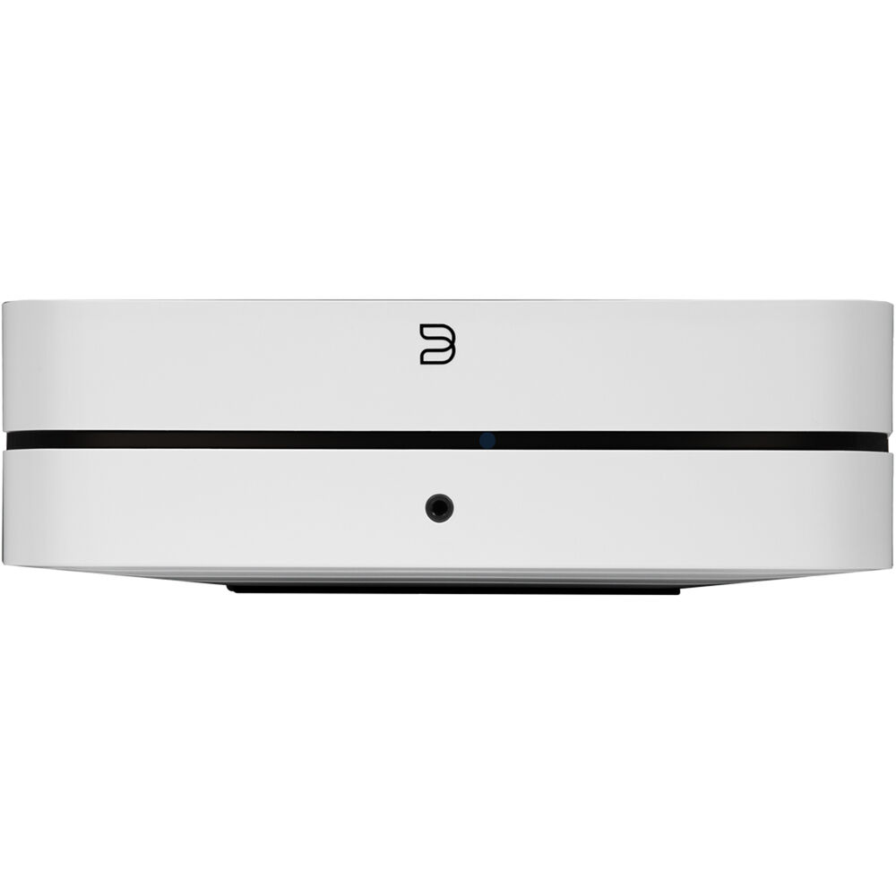 Bluesound Powernode 2025 music streamer with sleek black design and front display, connected to audio equipment.