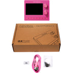 1010music Nanobox Razzmatazz drum machine with colorful pad interface and knobs for beat production and sampling.